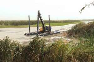 Une pelle amphibie Big Float de Remu en Mauritanie