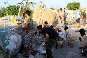Vingt-et-un morts dans l'offensive rebelle en Libye